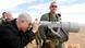 Netanjahu looks through binoculars at Israel's border Netanjahu looks through binoculars at Israel's border