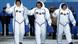 Three astronauts in space suits prepare for takeoff in Kazakhstan Three astronauts in space suits prepare for takeoff in Kazakhstan