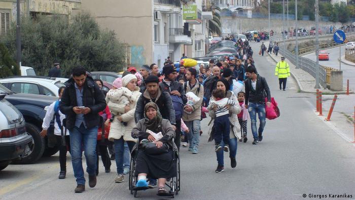 The massive arrival of migrants last year at the port of Kavala shattered the quiet city of northern Greece. Many people rushed to the port to see the newcomers. Some responded intensely, others violently. The majority of people nonetheless welcomed or simply accepted all those who fled from they homelands. The photo was taken by the journalist Giorgos Karanikas.
