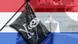 Piratenflagge, niederländische Flagge und Kriegsschiff (Montage: DW) Piratenflagge, niederländische Flagge und Kriegsschiff (Montage: DW)