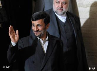 The Iranian president standing next to Ali Reza, the head of Iran's mission to the United Nations, in Geneva last month.