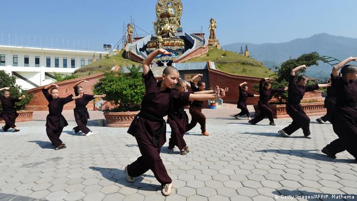 Buddhist nuns practise Kung-fu at the Amitabha Drukpa Nunnery