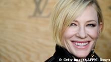 US actress Cate Blanchett poses during a photocall ahead of a diner for the launch of a Louis Vuitton leather goods collection in collaboration with US artist Jeff Koons, at the Louvre in Paris on April 11, 2017. / AFP PHOTO / GABRIEL BOUYS (Photo credit should read GABRIEL BOUYS/AFP/Getty Images)