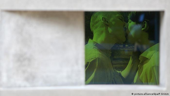 film still of men kissing