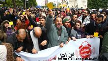 TUNIS, TUNISIA - JANUARY 12: People shout slogans during a protest against new budget law and price hikes as they march to the governorship building in Tunis, Tunisia on January 12, 2018. Yassine Gaidi / Anadolu Agency |