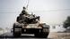 A Turkish tank heads towards the Syrian border A Turkish tank heads towards the Syrian border