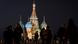 People walk in front of an illuminated St. Basil's Cathedral on Red Square in Moscow People walk in front of an illuminated St. Basil's Cathedral on Red Square in Moscow