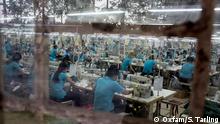 *****Achtung: Verwendung nur zur abgesprochenen Berichterstattung
Line-workers make trousers and jackets for international brands at a garment factory in Dong Nai province, Vietnam, on November 21, 2017.
According to the Forbes World’s Billionaires List 2017, eleven of the world’s fifty wealthiest people are linked to the fashion and retail industry.  Some of world’s biggest fashion brands source their clothes from countries where labour is cheap, such as Vietnam. The world’s five biggest garment companies payed their owners a total of $6.9 billion in 2016. One third of that amount would be enough to ensure a living wage for each garment worker in Vietnam.</p>
In 2015, Vietnam was the fourth-largest garment exporting country in the world, after China, India and Bangladesh. Exports go mainly to the United States (47 per cent of total export value), Europe (16 per cent) and East Asian countries including Japan and South Korea. </p>
<p>
The human cost is high. Employees at garment factories work six days a week, often at less than USD$1 per hour. Workers are under pressure to meet daily targets and end up working longer hours with barely any breaks or leave. Yet while billionaires are enjoying a bumper growth in their fortunes, the world's poorest women work long days with barely a break and still struggle to earn enough to feed their families. On average, it takes approximately 11 days for a CEO from the top five companies in the garment sector to earn what an ordinary worker earns in their lifetime in Vietnam.</p>
<p>
In Vietnam millions of people move from rural to urban areas to find better paid work to support themselves and their family. About 35% of female migrants end up working in the processing and manufacturing companies, such as garment factories. While they work in the same pressured conditions and for the same minimum wage as others, migrants are often charged twice as much for basic services such as electricity and clean water.  </p>
<p>
Over half of migrant workers travel alone, leaving their children and families in their hometown, with the majority travelling hundreds of kilometres from home in search of better paid employment. Migrants send on average almost a quarter of their income to their families, who remained in the countryside. Because of minimum wages, many can’t afford the journey home for themselves and end up not seeing their own children for months or even years.  </p>
