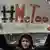 Mulher protesta com cartaz escrito "Me Too" nos EUA em 2017