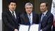North Korea's and South Korea's sports ministers and the IOC president pose with documents after a signing ceremony North Korea's and South Korea's sports ministers and the IOC president pose with documents after a signing ceremony