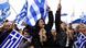 Protesters wave Greek flags Protesters wave Greek flags