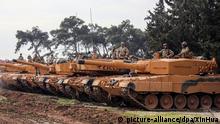 ERGÄNZT DETAILS - Türkische Soldaten bereiten am 21.01.2018 im Reyhanli-Distrikt in der Provinz Hatay, Türkei, ihre Panzer Leopard 2A4 auf den Einsatz vor. Die Türkei hat mit einer groß angelegten Militär-Offensive gegen kurdische Verbände in Syrien international Besorgnis ausgelöst. Foto: -/XinHua/dpa +++(c) dpa - Bildfunk+++ |