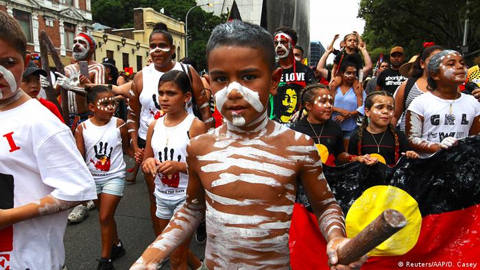 Indigenous children and others protesting on Australia Day
