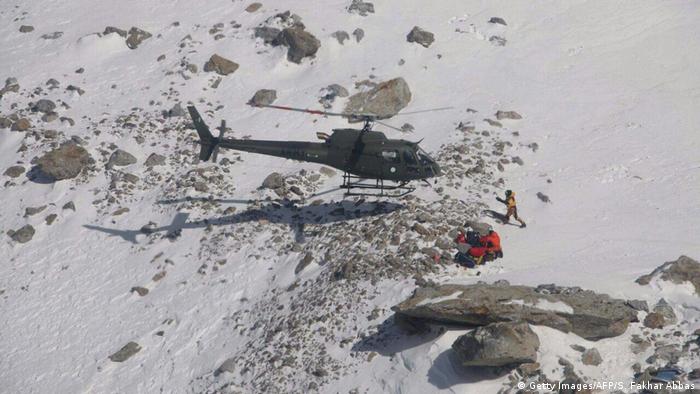 Members of the Polish K2 expedition rescue French climber Elisabeth Revol in Nanga Parbat