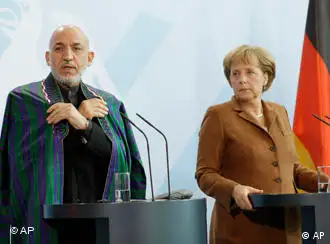 默克尔周日在柏林会见阿富汗总统卡尔扎伊