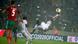 Nigerian football player kicks the ball acrobatically in a 2018 match against Morocco - Nigeria Nigerian football player kicks the ball acrobatically in a 2018 match against Morocco - Nigeria