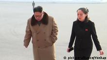 N.K. leader accompanied by his sister North Korea's top leader Kim Jong-un (L) walks up the steps to a performance hall with his younger sister Kim Yo-jong in Pyongyang in this photo capture from the North's Korean Central TV on Dec. 30, 2017. Kim Yo-jong was named an alternate member of the North's ruling party politburo, the top decision-making body, in October in a move that tightened the Kim family's grip on the country. (For Use Only in the Republic of Korea. No Redistribution) (Yonhap)/2017-12-31 09:54:48/ | Keine Weitergabe an Wiederverkäufer.