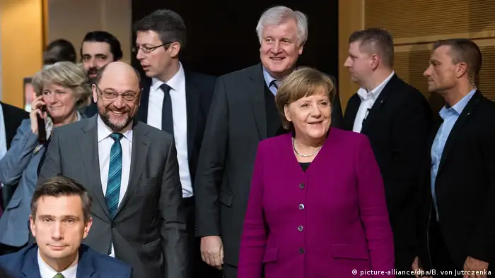 Merkel with Schulz and Seehofer as well as many aides after the coalition talks