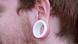 Flesh tunnel - Mann mit Ohrenpiercing Flesh tunnel - Mann mit Ohrenpiercing