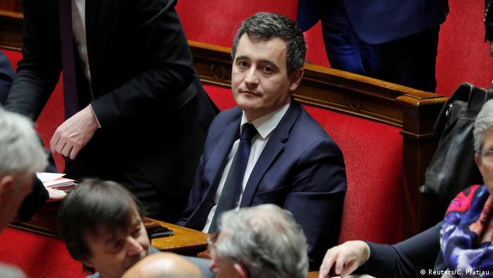 Gérald Darmanin sits in parliament