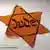 A patch with the word 'jew' in the shape of a Star of David