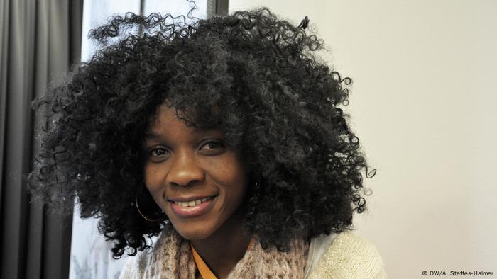  Machérie Ekwa Bahango , head shot of a woman smiling into the camera 