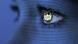 The eye of a woman showing the Facebook logo The eye of a woman showing the Facebook logo