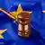 A judge's gavel over a European flag