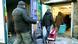 People walking into a Tafel branch People walking into a Tafel branch