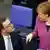 Angela Merkel i Jens Spahn w Bundestagu 
