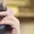 Symbolbild USA Präsident Trump am Telefon Ausschnitt