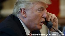 President Donald Trump talks with new Irish Prime Minister Leo Varadkar during a telephone call, Tuesday, June 27, 2017, Oval Office of the White House in Washington. (AP Photo/Evan Vucci) |
