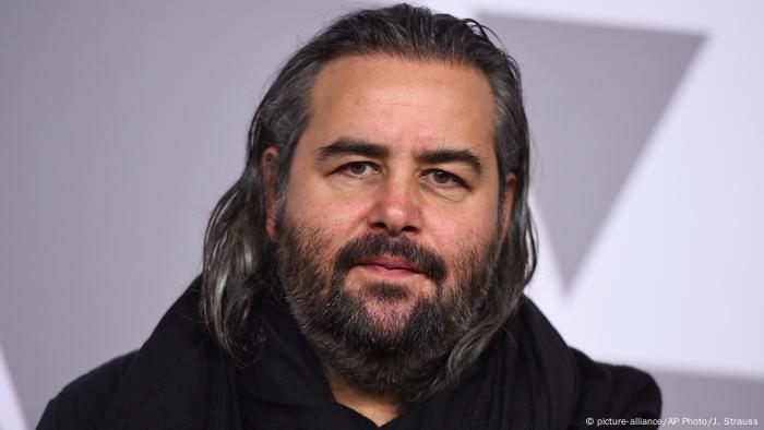 Cameraman Hoyte van Hoytema looks directly into the camera