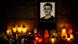Candles surround a picture of Jan Kuciak Candles surround a picture of Jan Kuciak