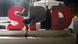Massive SPD letters being covered in dark sheets on a stage after campaign event Massive SPD letters being covered in dark sheets on a stage after campaign event