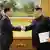 North Korean leader Kim Jong Un greets Chung Eui-yong, head of the presidential National Security Office, in Pyongyang, North Korea