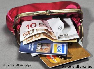 Offene Geldbörse mit Euroscheinen und Münzen (Foto: pa/dpa)