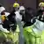 Police officers put on protective suits in Salisbury