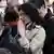 Japoneses fazem um minuto de silêncio durante cerimônia em Tóquio