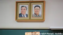 In this Sept. 26, 2017 photo, a student cleans the blackboard under the portraits of the late North Korean leaders Kim Il Sung and Kim Jong Il hanging on the classroom wall at a Tokyo Korean high school in Tokyo. Many third- and fourth-generation descendants of Koreans brought to Japan during the imperialist years before and during World War II remain loyal to their roots. Families send children to private schools that favor North Korea and teach the language, culture and history of their ancestry. Despite recent North Korean missile launches and nuclear tests, students say they take pride and view their community as a haven from the discrimination they face from ethnic Japanese. (AP Photo/Eugene Hoshiko) |