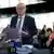 Глава делегации ЕС на переговорах по "Брекзит" Мишель Барнье слушает выстуление Юнкера в Европарламенте