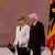 Angela Merkel şi Frank-Walter Steinmeier la ceremonia de la Palatul Bellevue