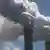 Carbon spewing from smoke stacks