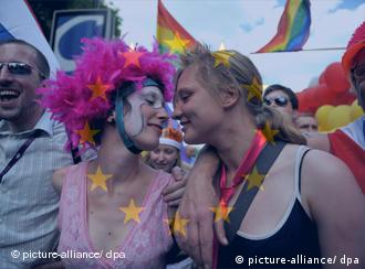 Two women at a gay pride event.
