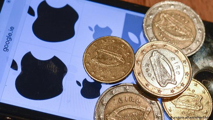 A generic picture of Irish euro coins beside Apple's logo depicting the legal row over Apple owing Ireland $14 billion in back taxes as claimed by the EU.