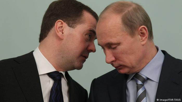 Vladimir Putin (left) and Dmitry Medvedev