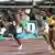 100-Meter Sprint der Frauen: Beim Foto-Finsih legen sich alle mit dem Oberkörper nach vorn (picture-alliance)