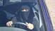 Woman driving with full face veil Woman driving with full face veil