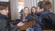 Three Youth Vibes reporter are interviewing a young asylum seeker in their city.