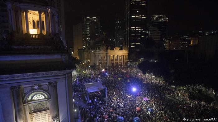 Thousands gather in front of the Municipal Theater during a protest against the murder of Marielle Franco in Rio de Janeiro, on March 20, 2018
